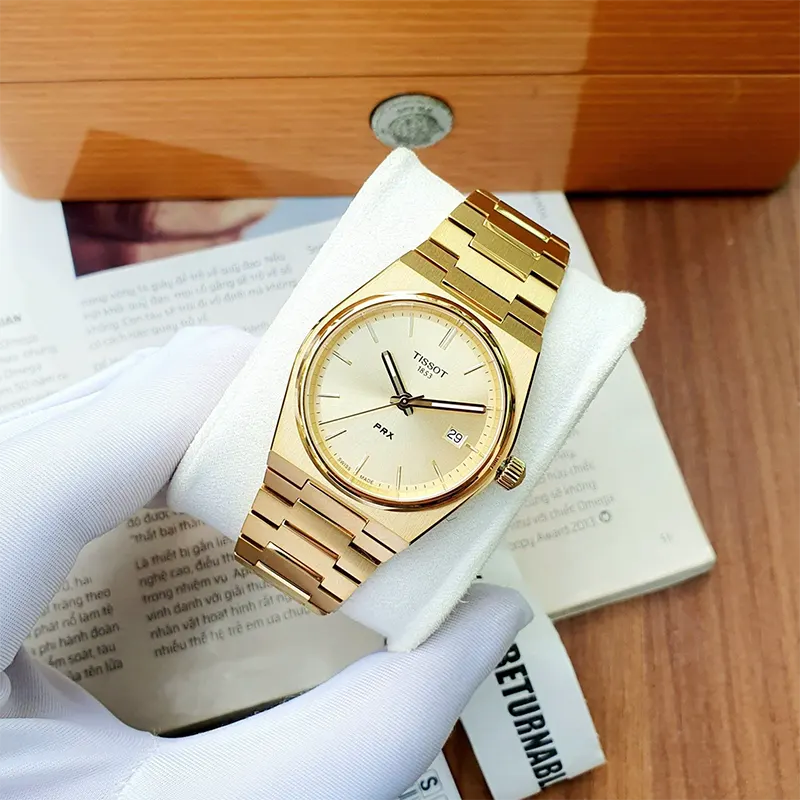 Tissot PRX 35mm Champagne Dial Gold-tone Unisex Watch- T137.210.33.021.00